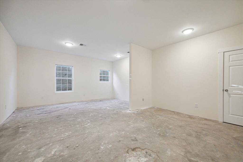 383 sqft of air conditioned space below apartment and next to garage. Great for a gym or gameroom area.