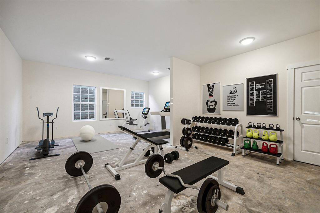 383 sqft air conditioned flex space (virtually staged), great for a gym or recreational area.
