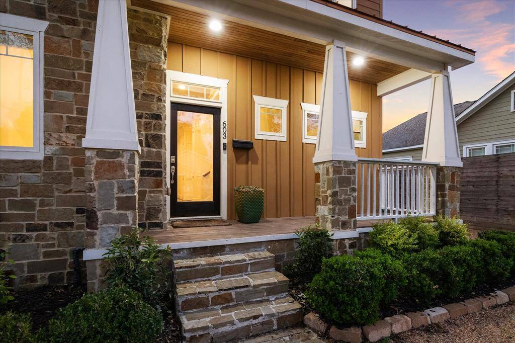 Front porch with room for a bench or swing.