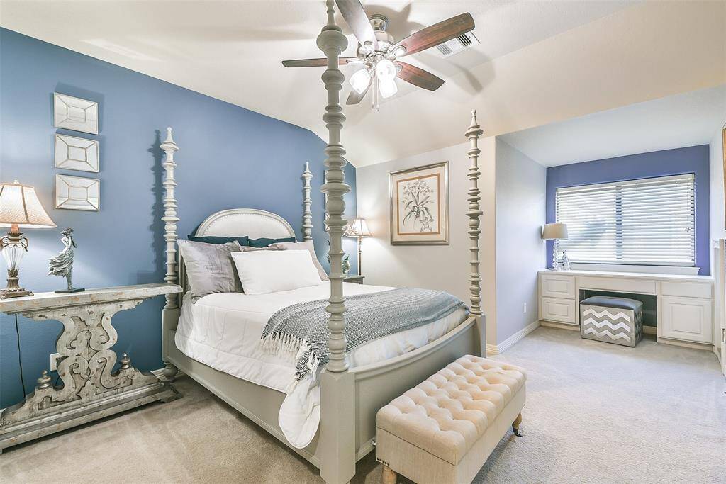 Upstairs optional master suite! Beautiful custom paint, high ceilings, and lighted ceiling fan. Built in desk space with large window for natural lighting. Attached personal bathroom space with large vanity area. Enormous walk in closet space and walk-in attic access door for additional storage space in this room.