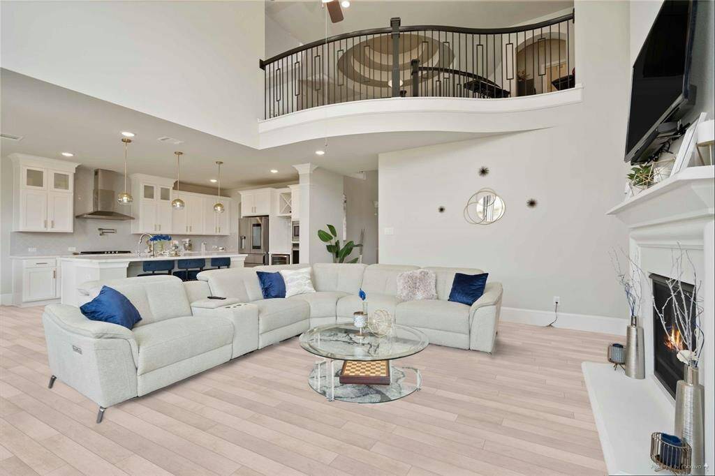 living room brand new lvp flooring***photos staged from previous photos***