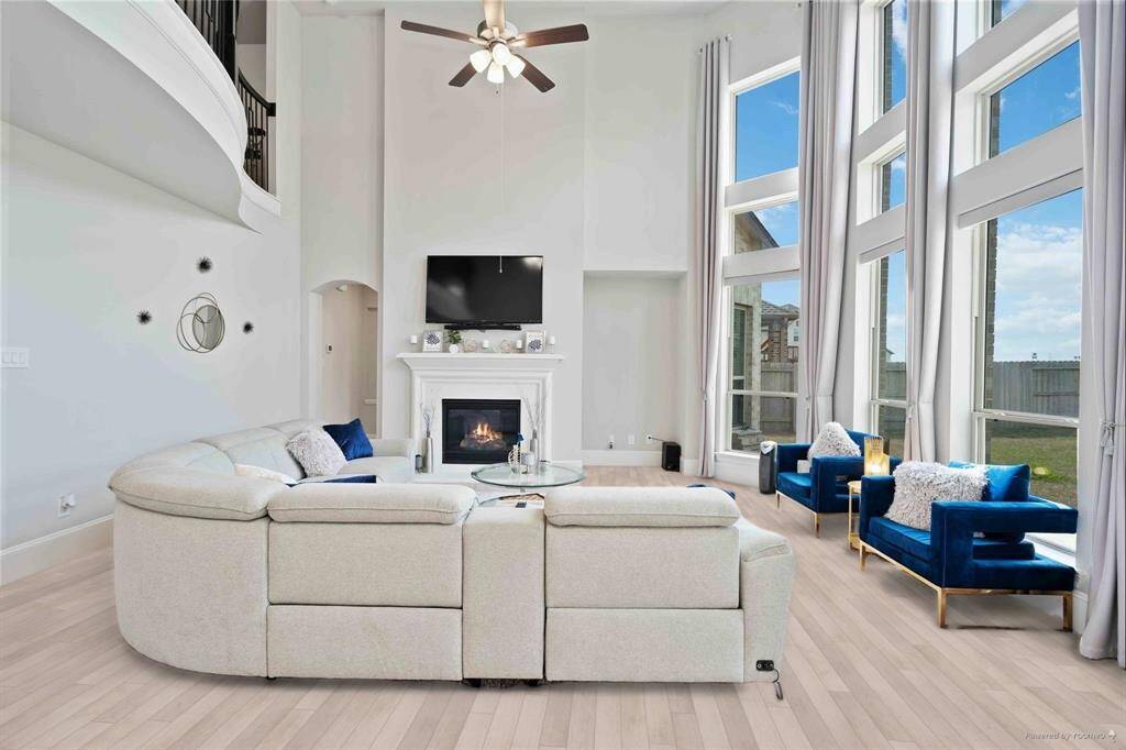 Living room brand new LVP flooring***photos staged from previous photos***