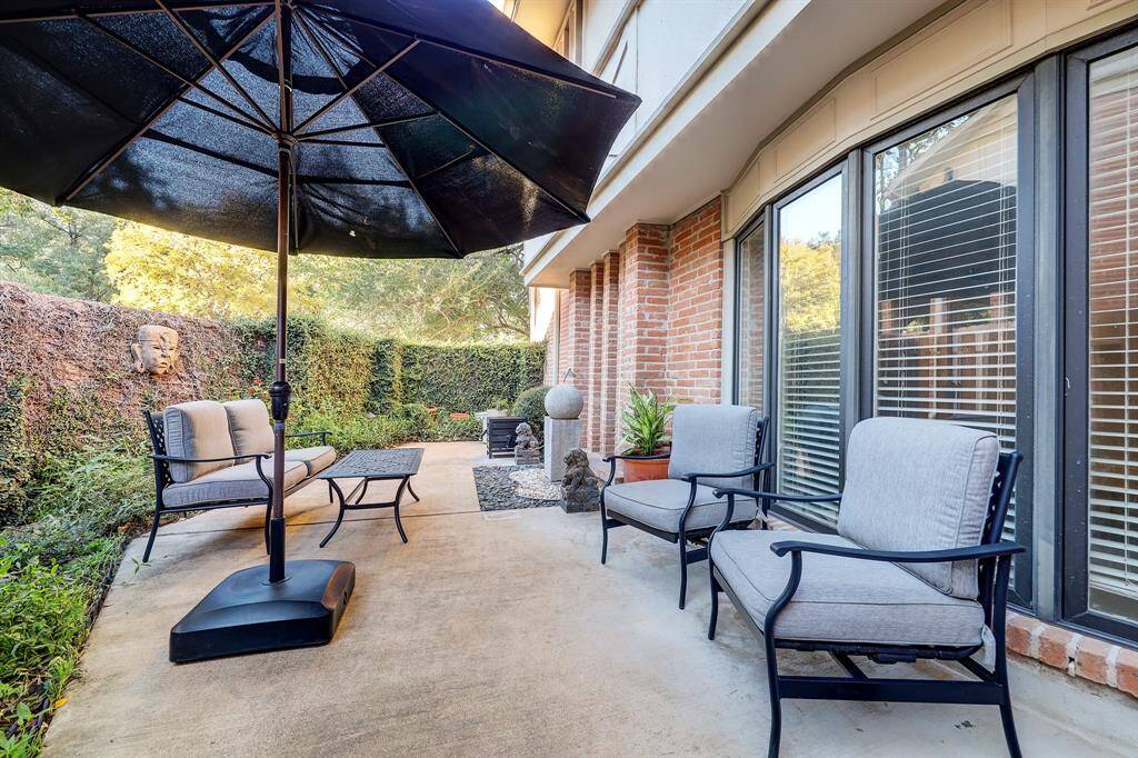 Large, gorgeous private patio as you enter the property.