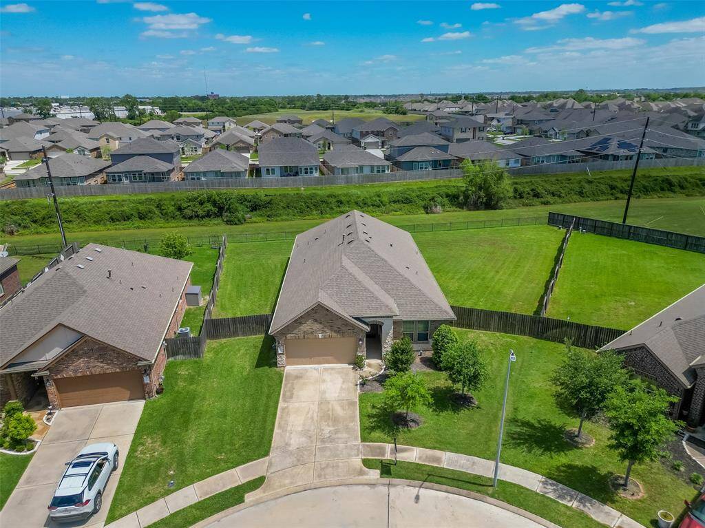Aerial view of this huge corner lot located in a cul-de-sac