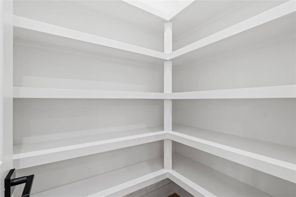 The large pantry with perfect built-in's makes kitchen organization a breeze.