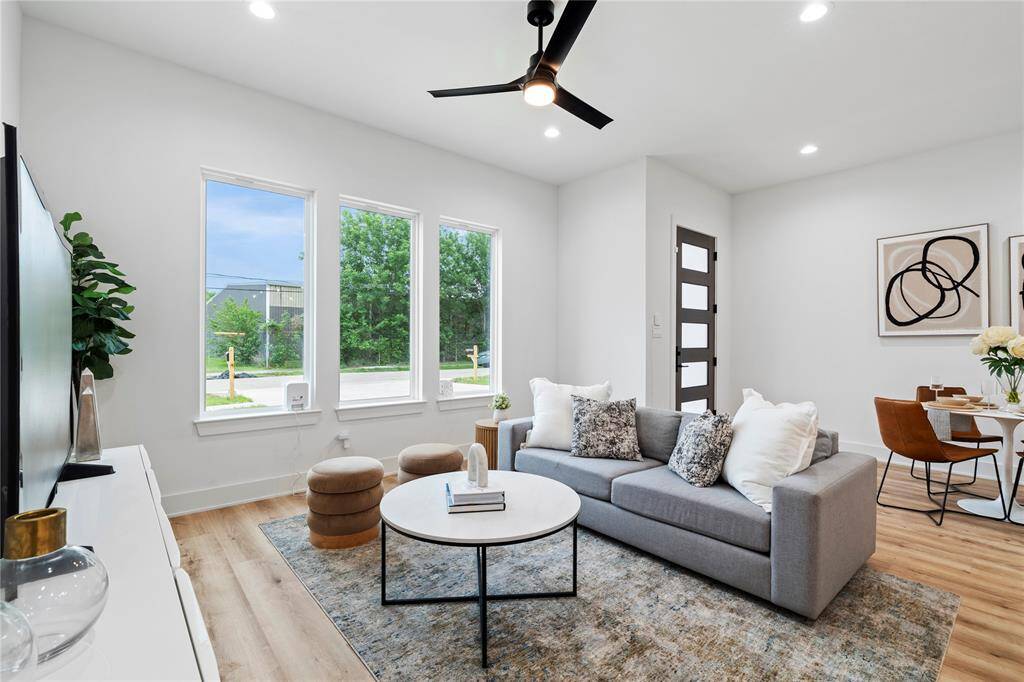 A seamless blend of openness and natural light, this thoughtfully designed living space offers a bright and airy ambiance, perfect for both relaxation and connection.