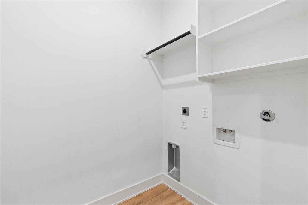 Say goodbye to clutter—this built-in utility room is ready for baskets, detergents, and everything in between.