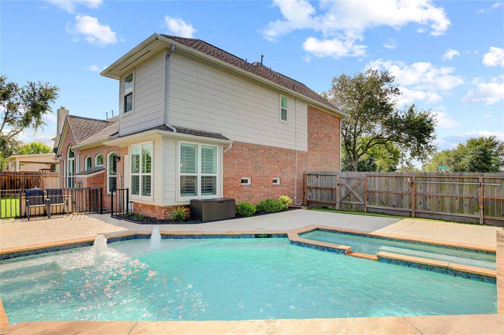 Imagine spending your summers in this incredible backyard oasis—relax by the sparkling pool, unwind in the soothing spa, and enjoy endless fun and memories with family and friends. This is the ultimate space for sun-soaked days, backyard barbecues, and unforgettable evenings under the stars!