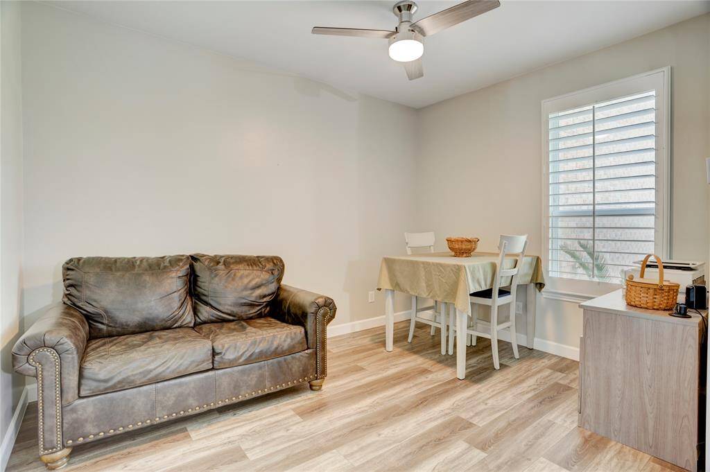 This space can be used as a study, formal living space or what ever best suits your lifestyle. It has wood-look flooring and a ceiling fan, creating a comfortable and inviting atmosphere.