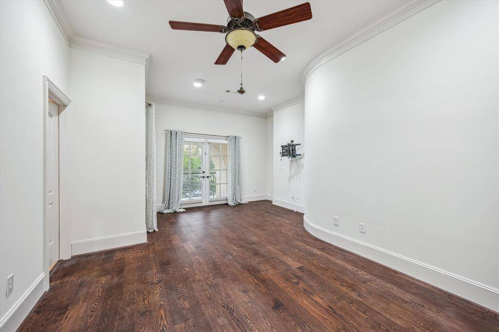 This bright upstairs retreat offers French door access to a charming Juliet balcony and includes its own en-suite bath — ideal for guests or family.