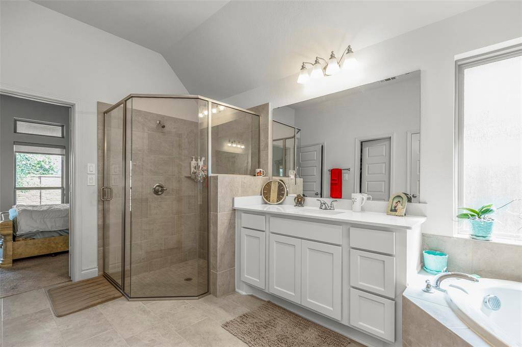 Primary bathroom featuring spacious shower