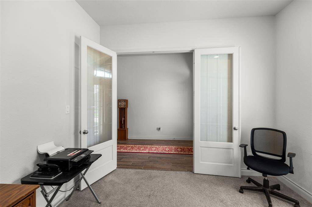 Office off of the front entry way. French doors!