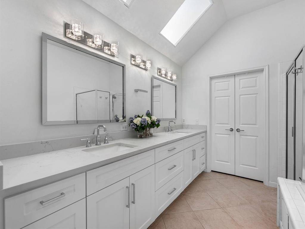 The Primary Oasis includes double sinks and plenty of counterspace with ample storage.