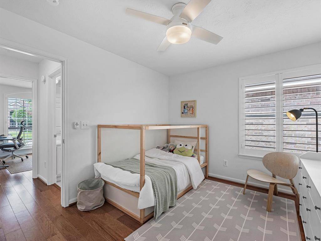 1 of 2 Secondary Bedrooms with Plantation Shutters.