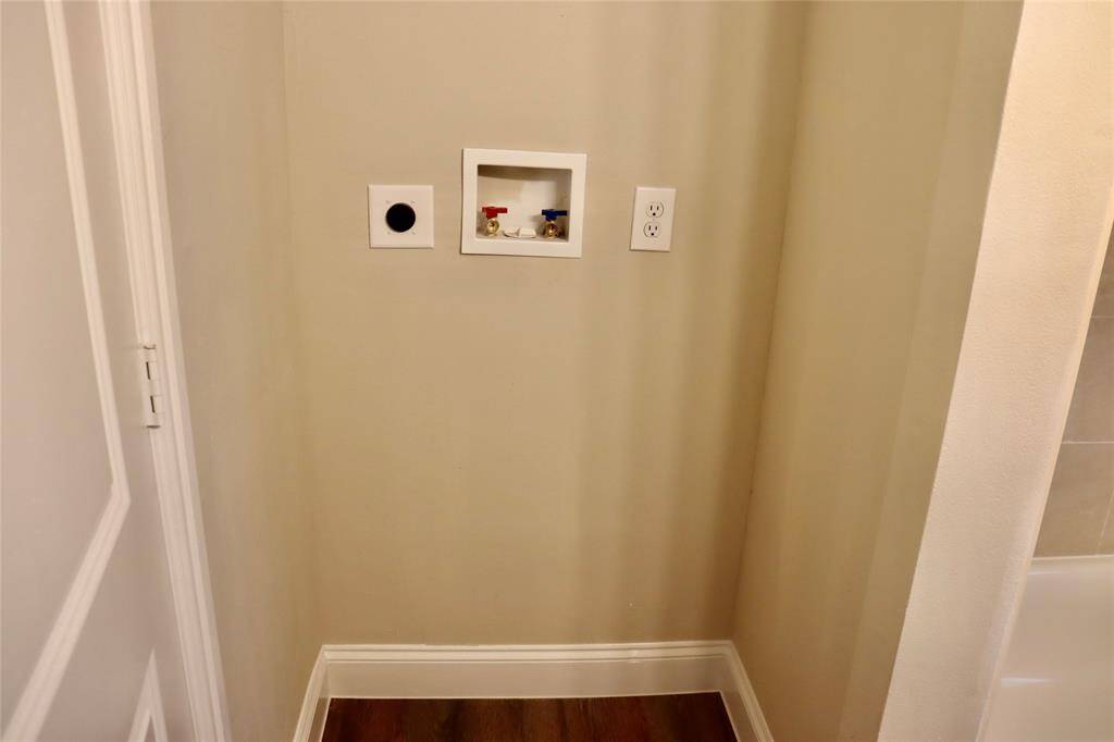 Washer and dryer connections in secondary bathroom