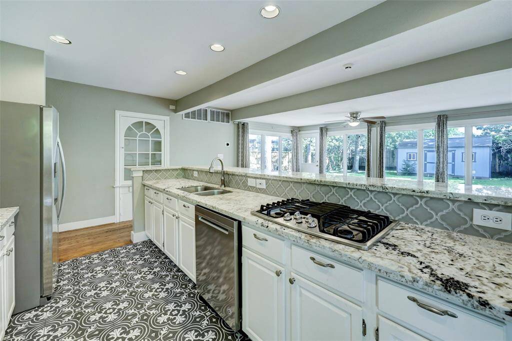Enjoy the finest of open concept living with a state of the art kitchen.