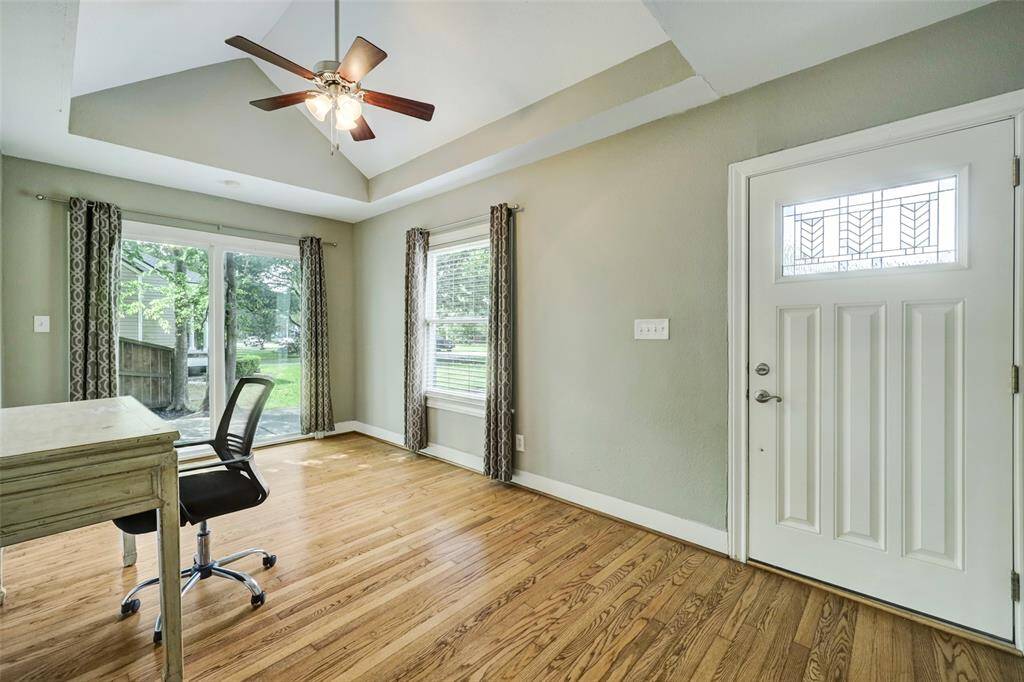 Providing additional room space, this stunning sun room is elegant as a formal sitting area, front living room, or fabulous office.