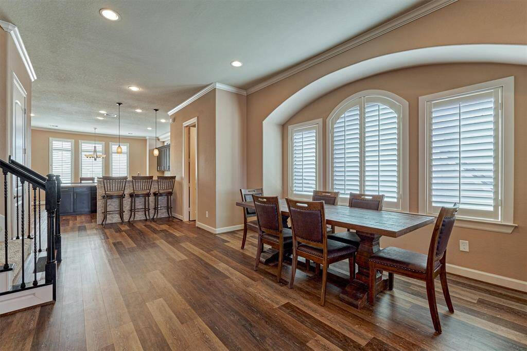 The second level steps into a formal dining area, conveniently located between the kitchen and living room.