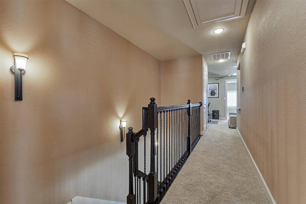 The third floor features the primary bedroom and bath, office area, third bedroom and full bath.