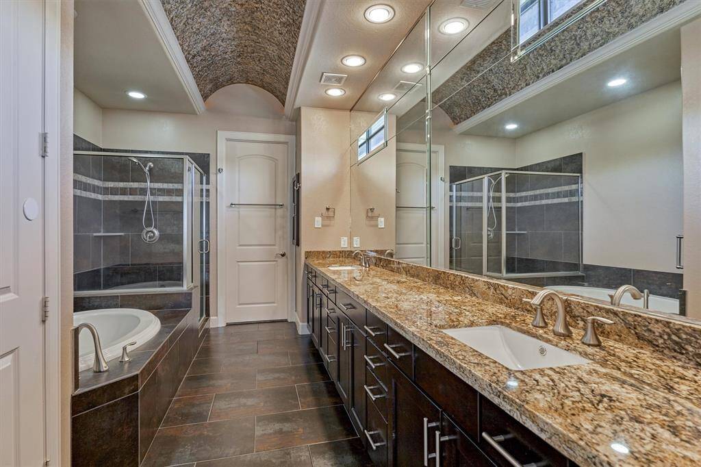 Look at the abundance of counter space in this primary bath!