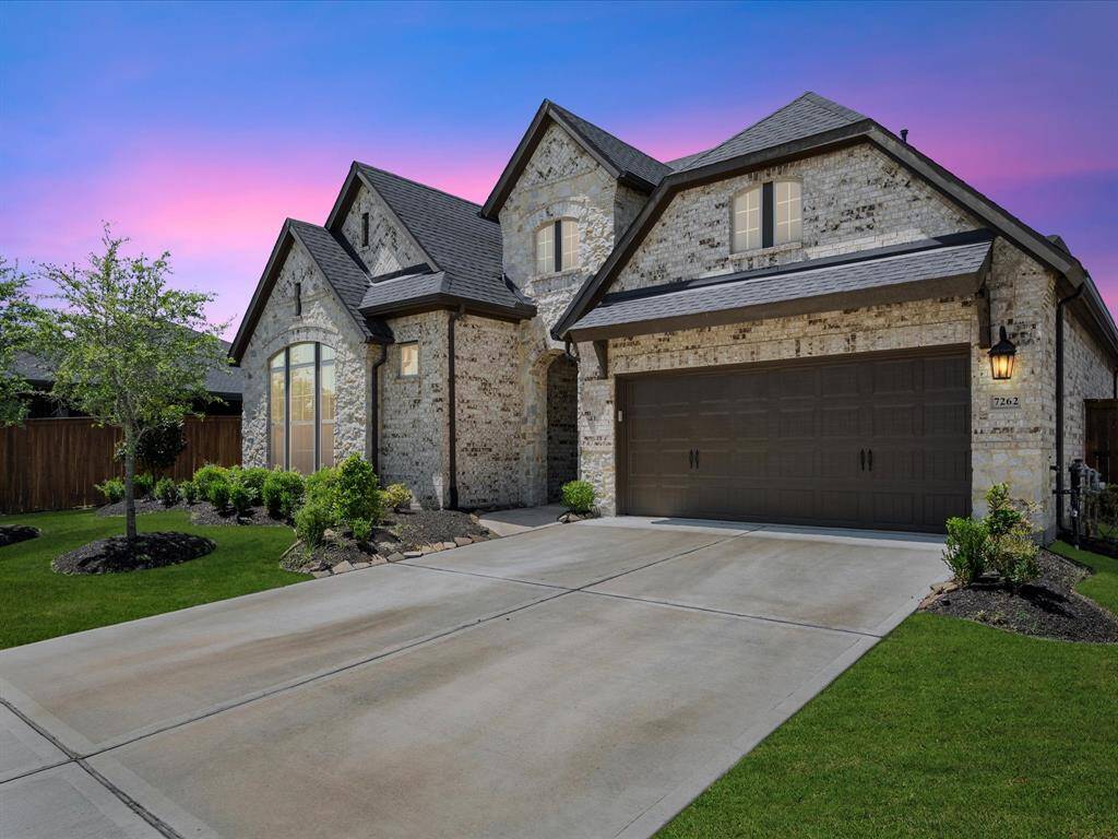 The charming stone and brick exterior, manicured landscaping, and large windows provide exceptional curb appeal. Ideal for both entertaining and everyday living, this home seamlessly blends functionality with elegance.
