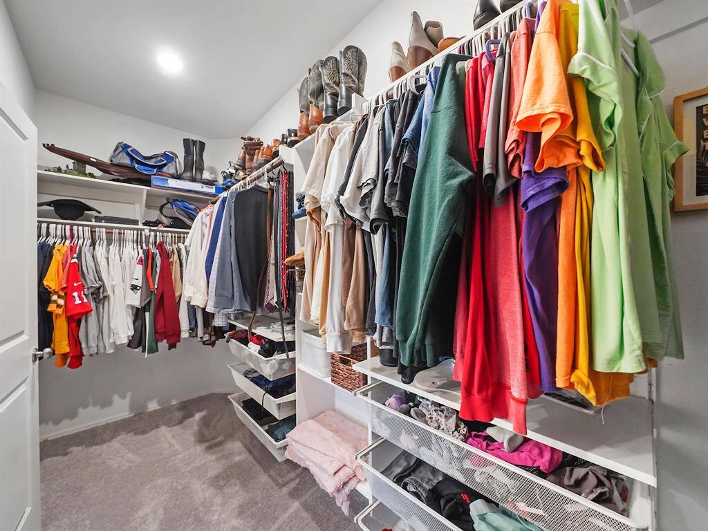 Generous walk-in closet provides ample storage space for all your essentials.