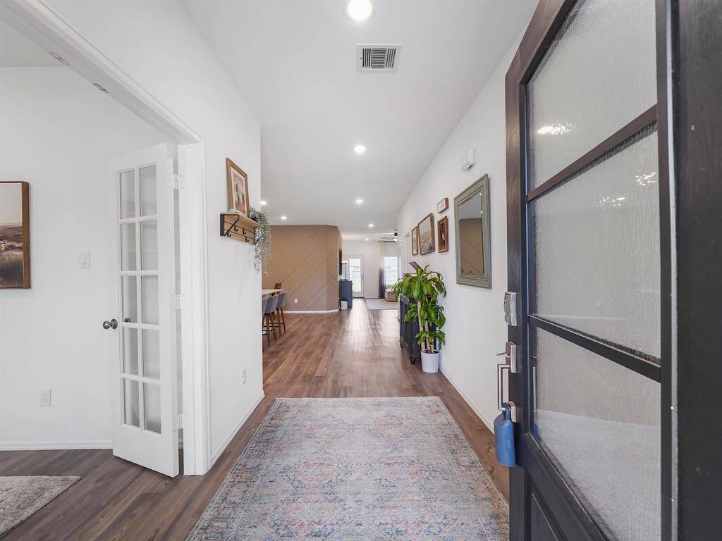 Experience elegance in this exquisite interior featuring vinyl flooring in main living areas and wet areas, harmoniously enhanced by soothing tones that create a tranquil and inviting atmosphere throughout.
