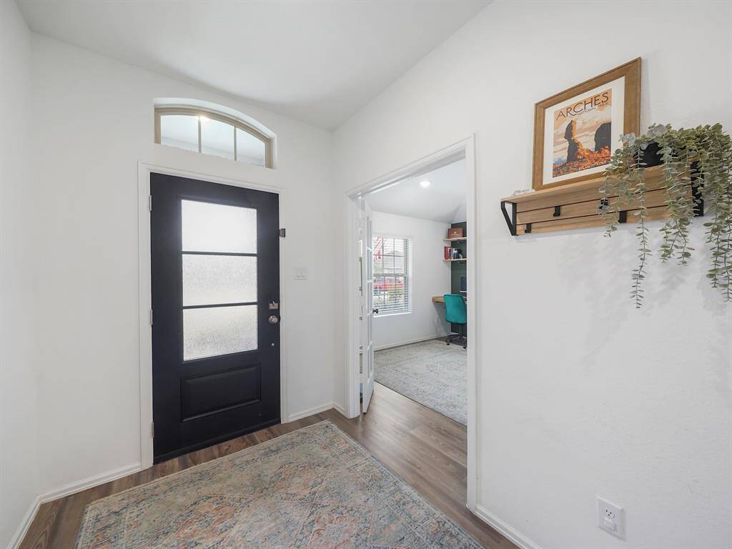 Alternative view of the entryways showcasing the french door entry to the study.