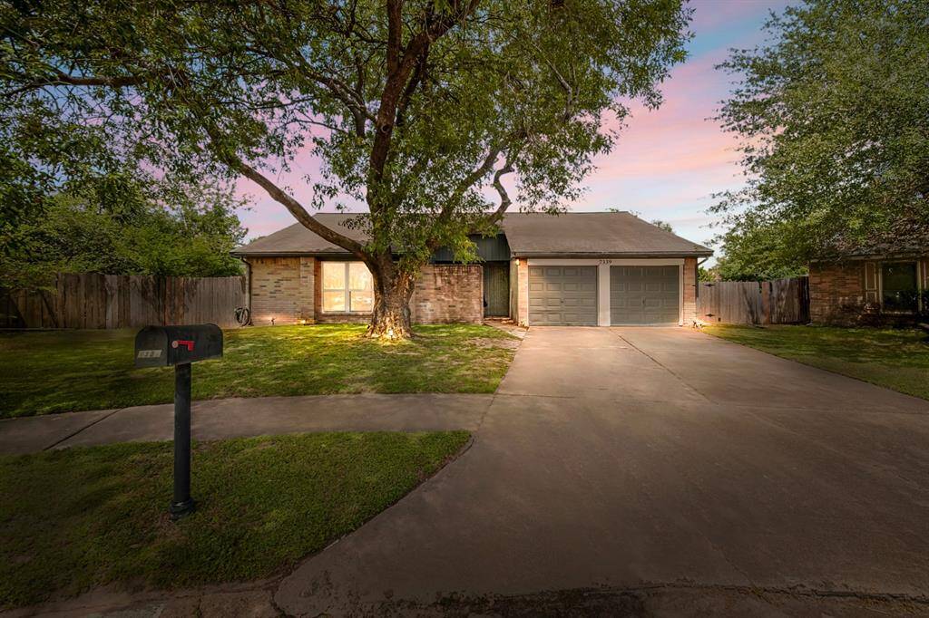Welcome to 7339 Skybright Lane, a beautiful one-story home in Sommerall! With its brick exterior and massive oak tree, the curb appeal of the home is striking.