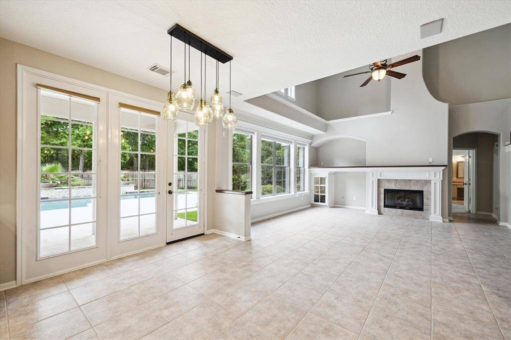 The breakfast area is filled with natural light and opens to the kitchen and living room, making it a perfect spot to enjoy your morning coffee or family meals.