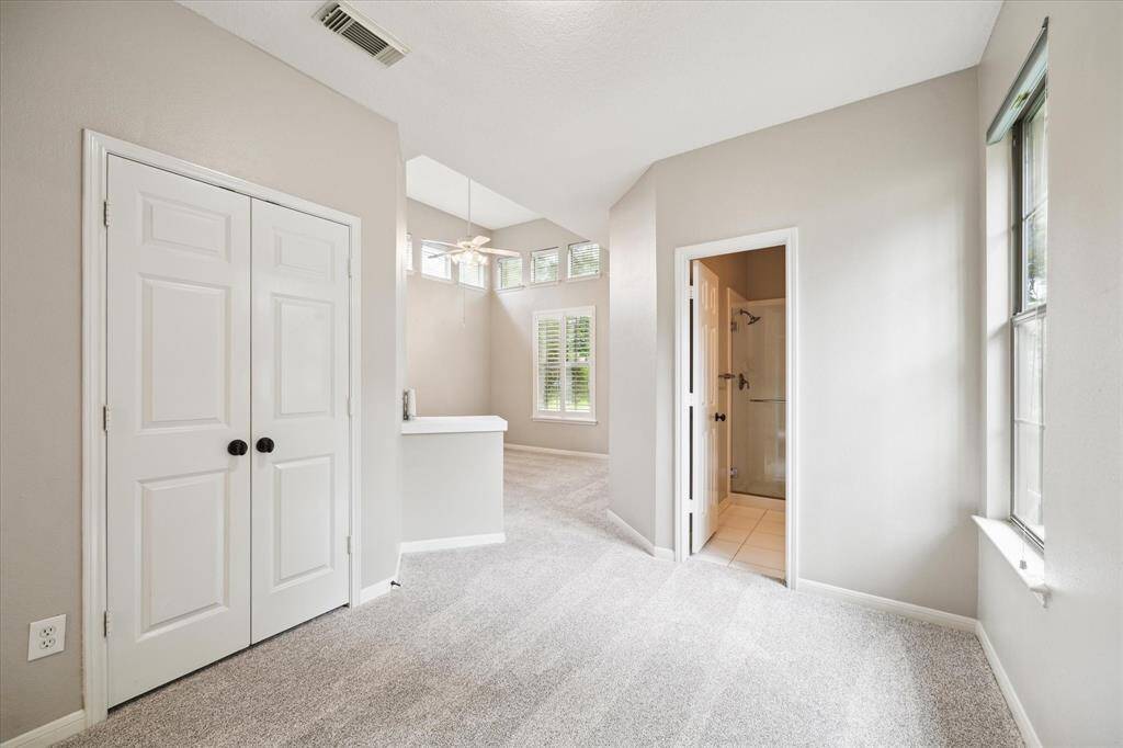 This flexible space serves as the lounge area for the private guest suite, though its layout easily adapts to suit a variety of personal preferences or lifestyle needs.
