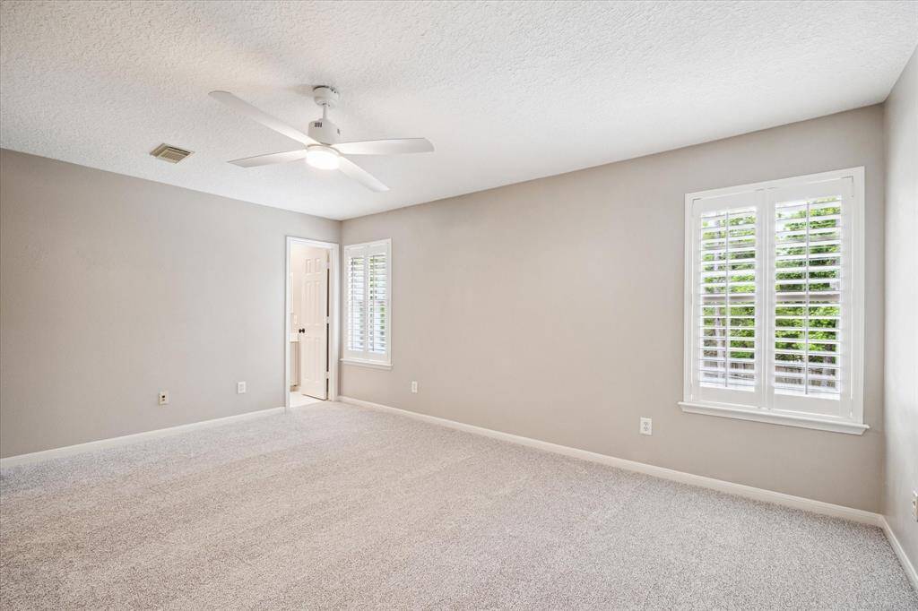 Another perspective of the spacious secondary bedroom located on the second level.