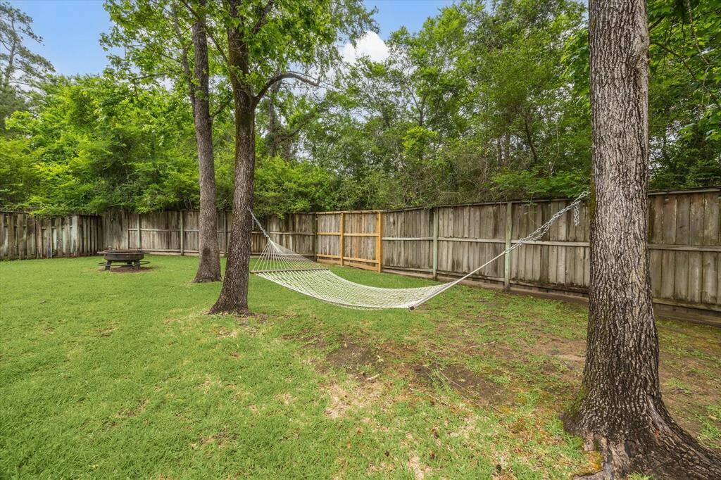 This property features mature trees and privacy. Exemplary schools.