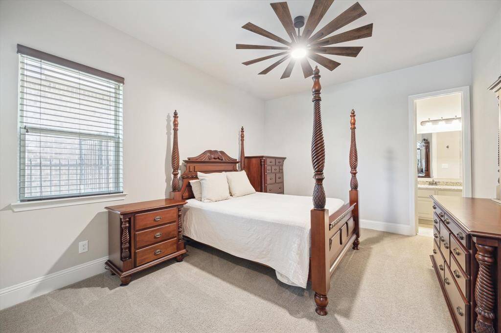 Downstairs bedroom with en suite bathroom  It has an additional sitting area not pictured.