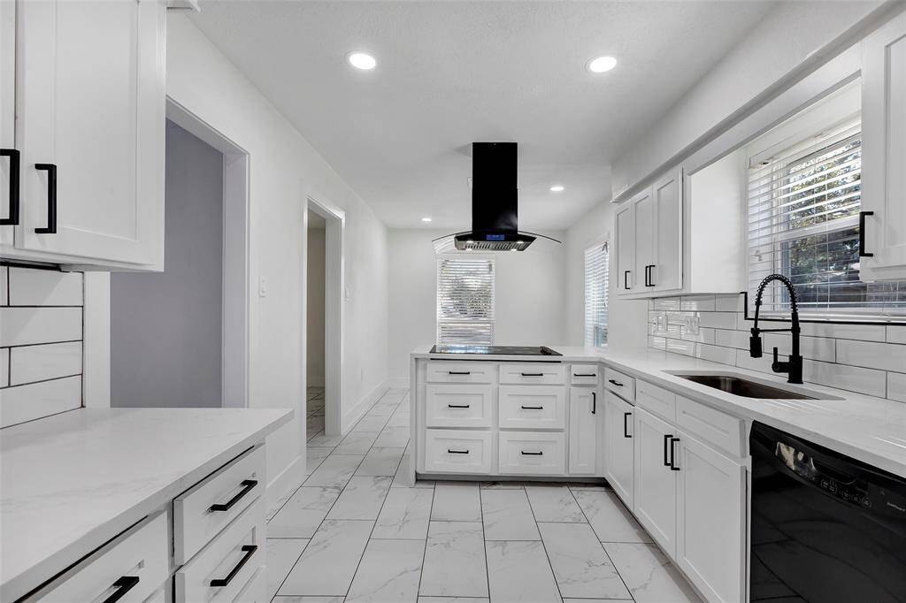 Abundant cabinetry throughout provides ample storage space, perfect for keeping everything organized and within easy reach.