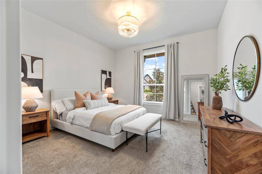 The second downstairs bedroom is also spacious and comfortable. This is a great in-law suite or private guest suite with its own private en-suite bath.