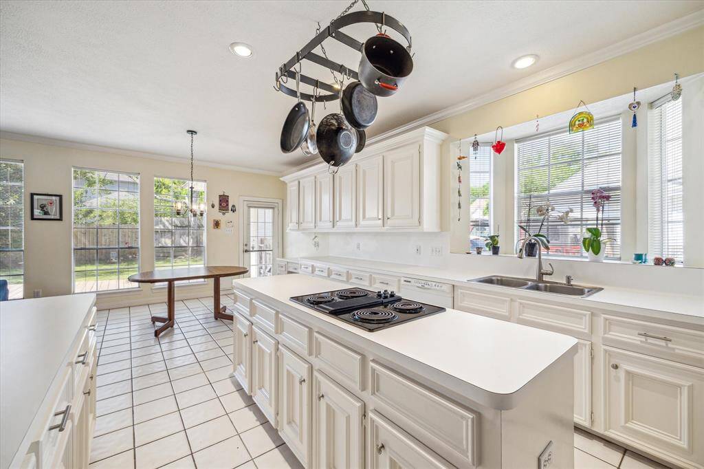 Charming bay window above the sink, with a cozy breakfast area just off the kitchen.