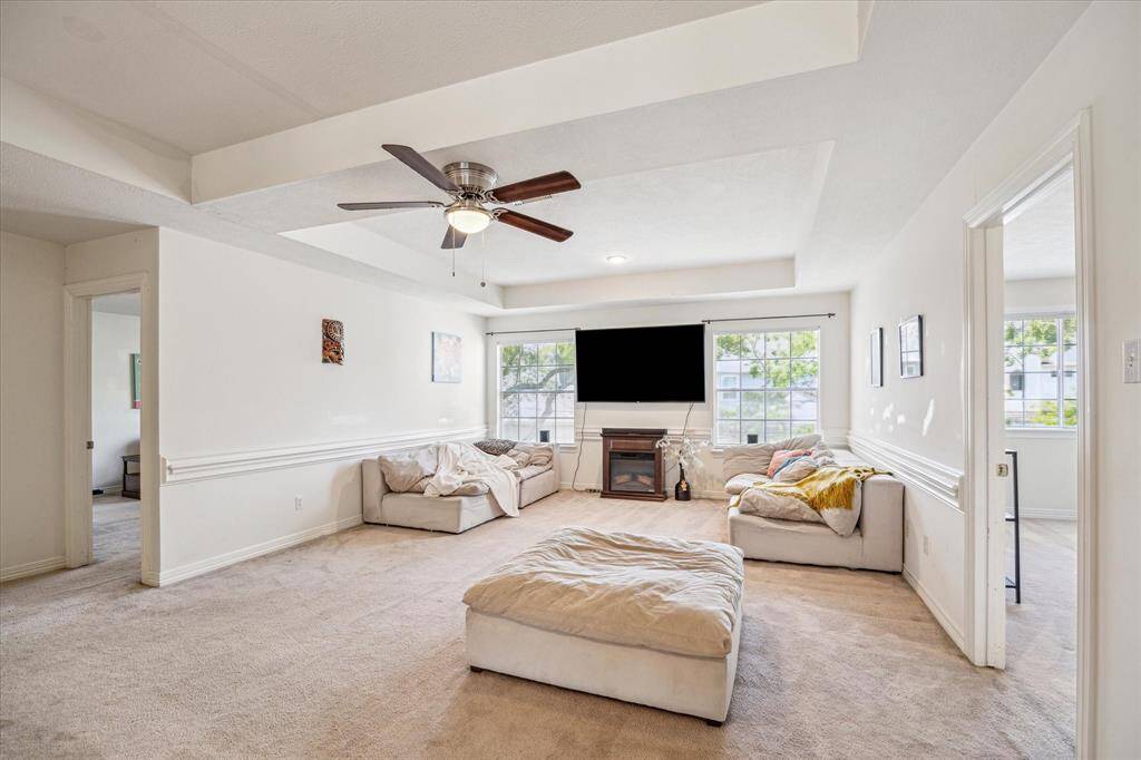 Game room seamlessly connects the four secondary bedrooms upstairs, creating a central hub for family activities and entertainment.