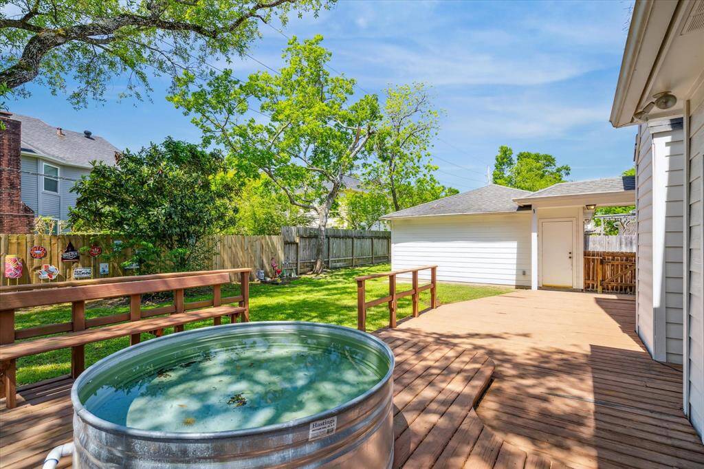 Charming cowboy pool in the backyard, offering a unique and refreshing retreat for warm-weather relaxation.