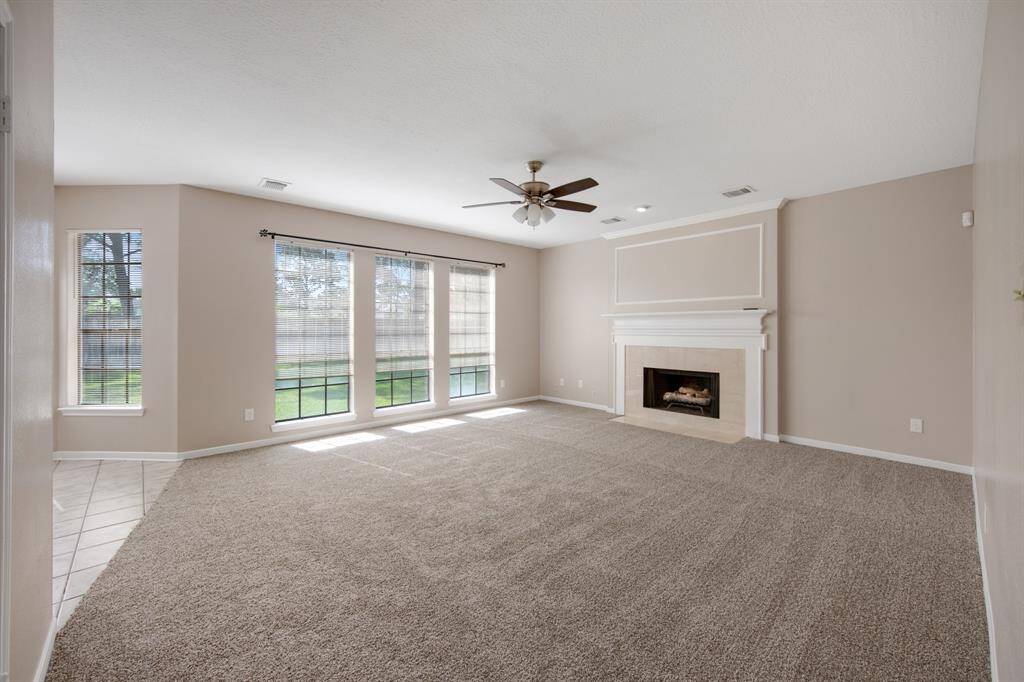 cozy fireplace and neutral tones create a warm, inviting atmosphere.