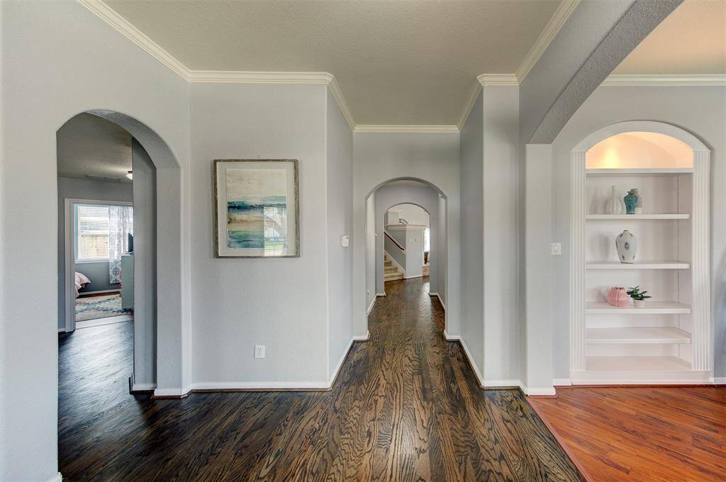 Stunning arches and molding throughout.