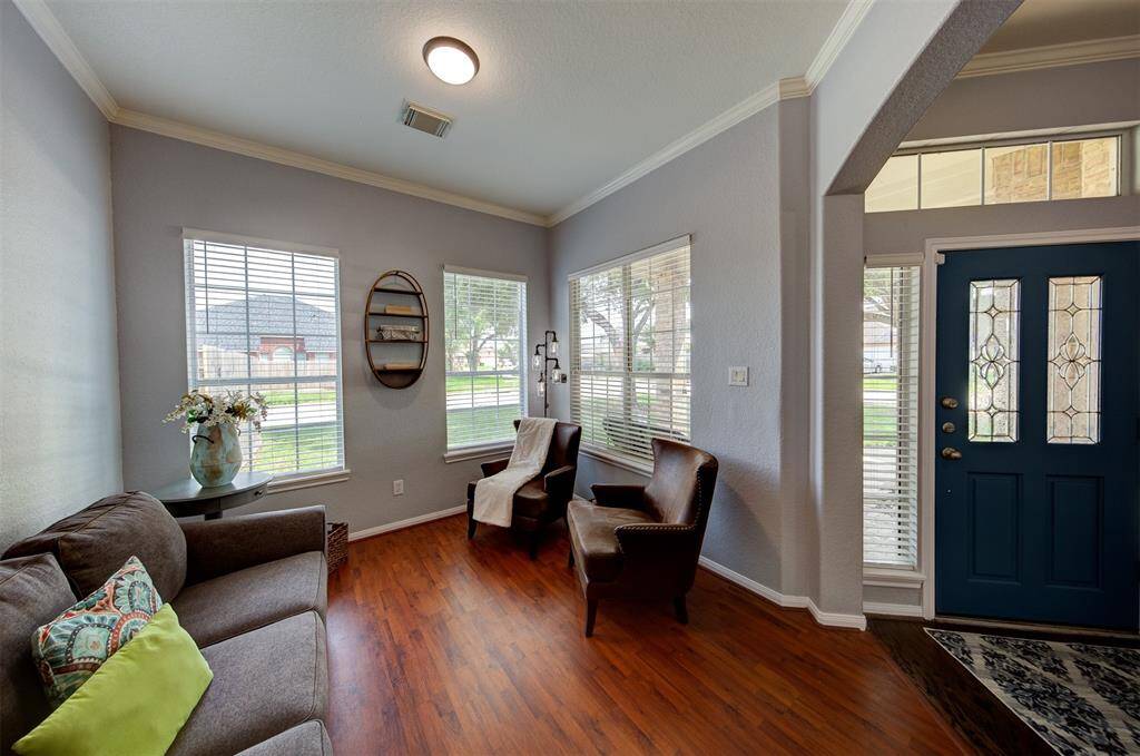 Smooth wood flooring in the den.