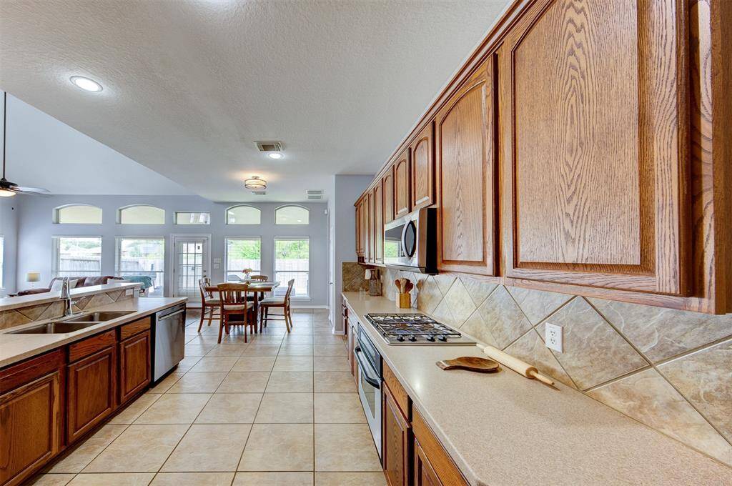 Abundance of cabinets in the gourmet kitchen.