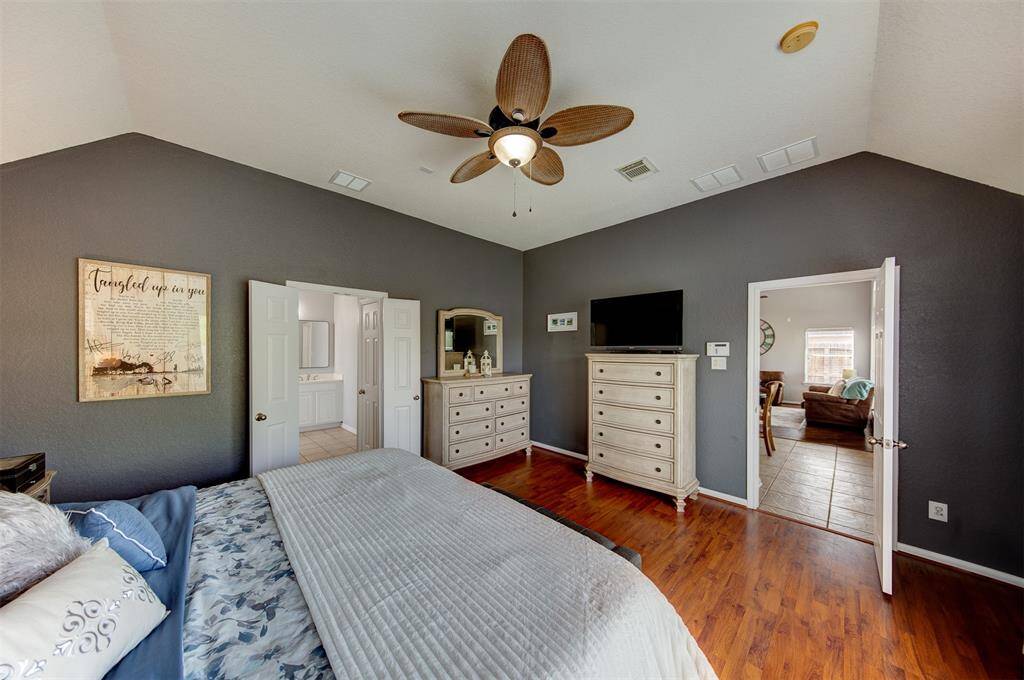 Primary suite is a private escape located just off the kitchen.