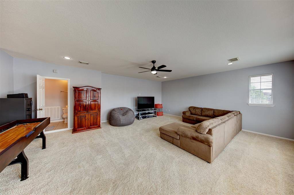 Giant game room upstairs.
