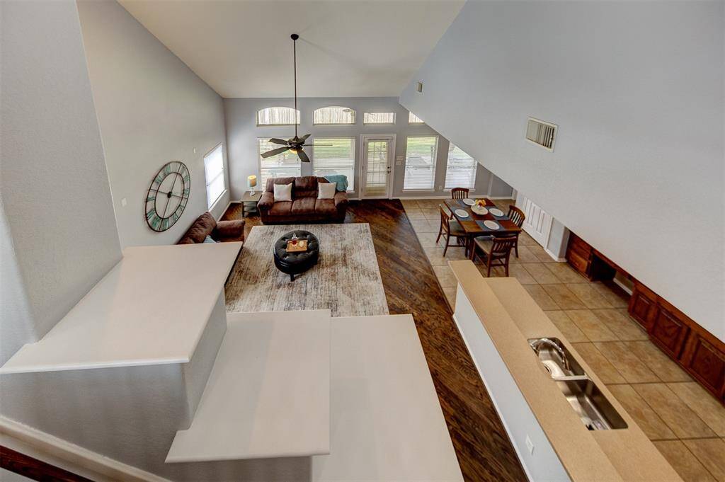 Game room overlooks the family room.
