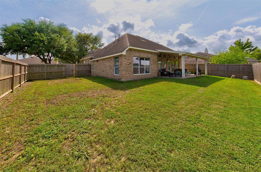 Big, fully fenced backyard.