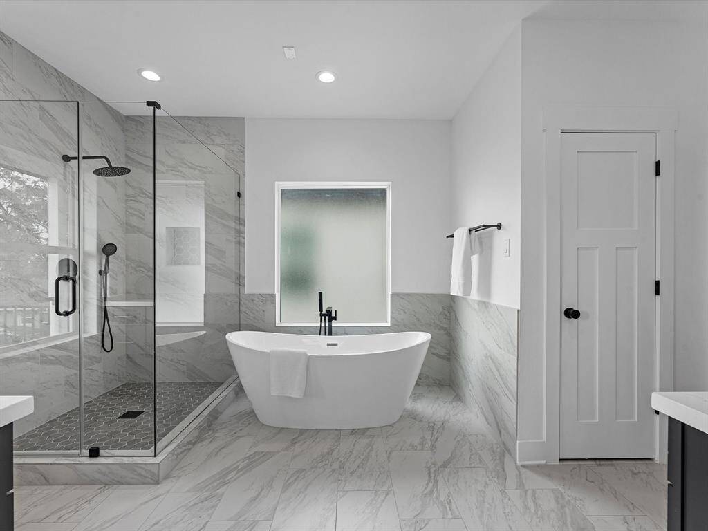 Primary Bathroom with standalone tube and large shower