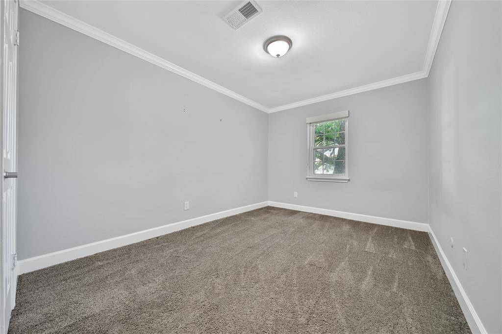 Upstairs secondary bedroom.