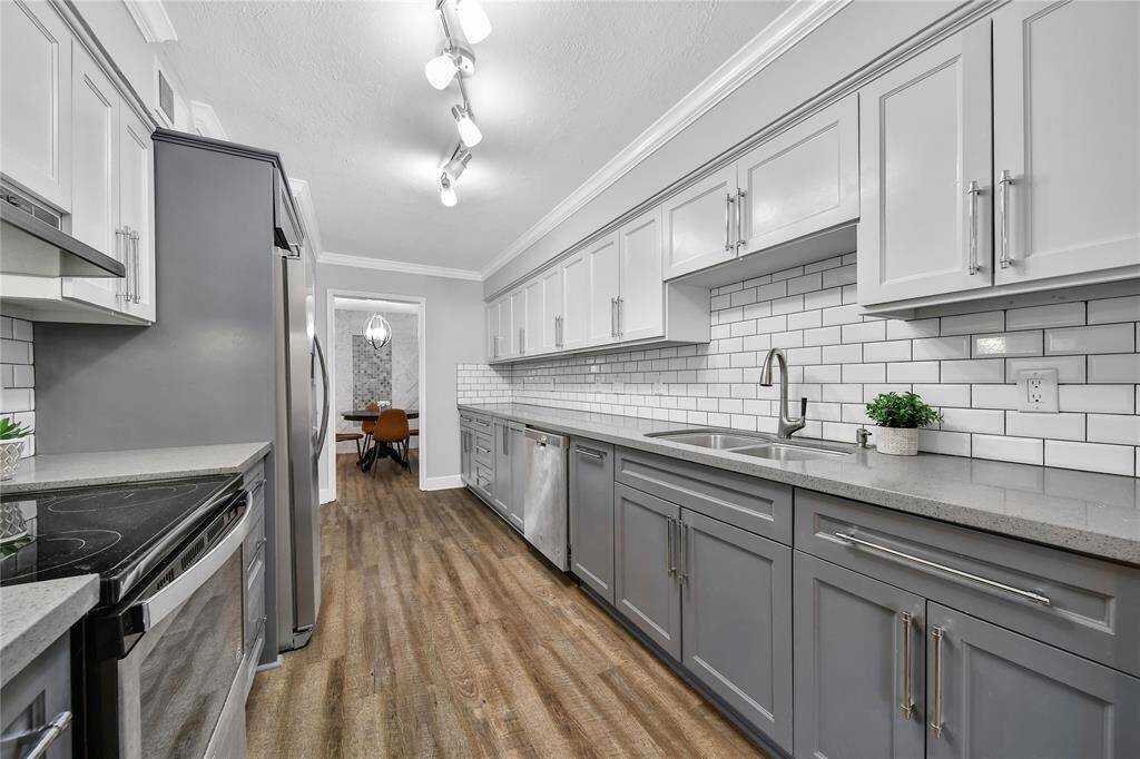 Beautiful kitchen featuring updated appliances and custom cabinetry.
